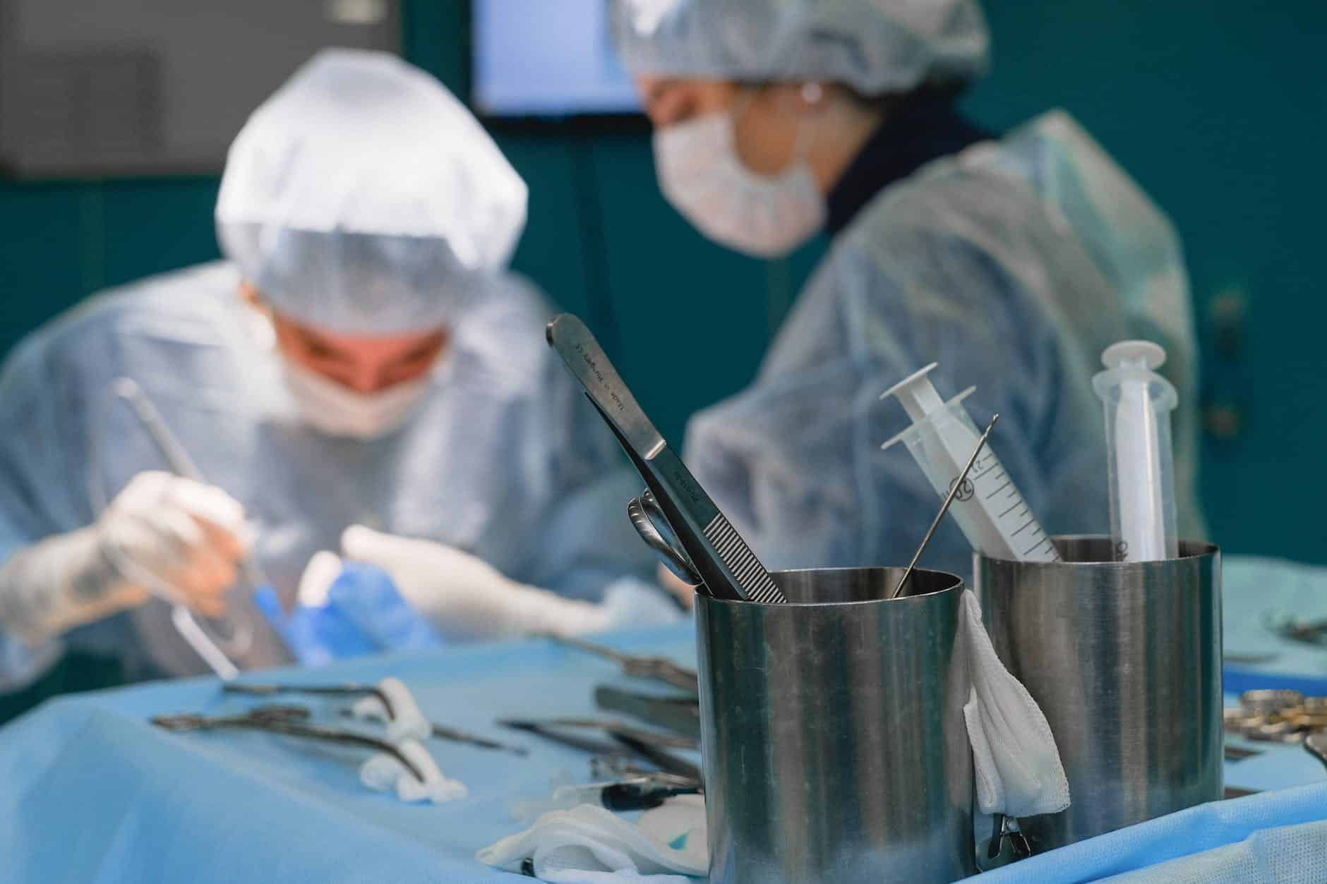 medical instruments and a surgeon during a surgery